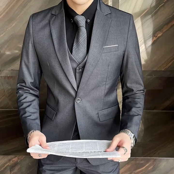 Sharp men's three-piece slim fit suit set including jacket, vest & trousers for a modern, professional look.