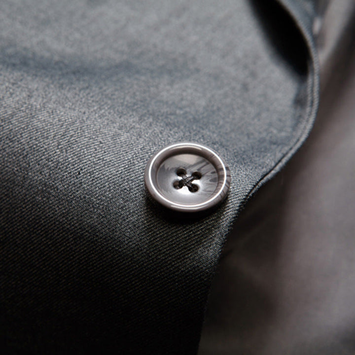Elegant men's three-piece suit, slim fit design. Ideal formal event attire or professional business wear.