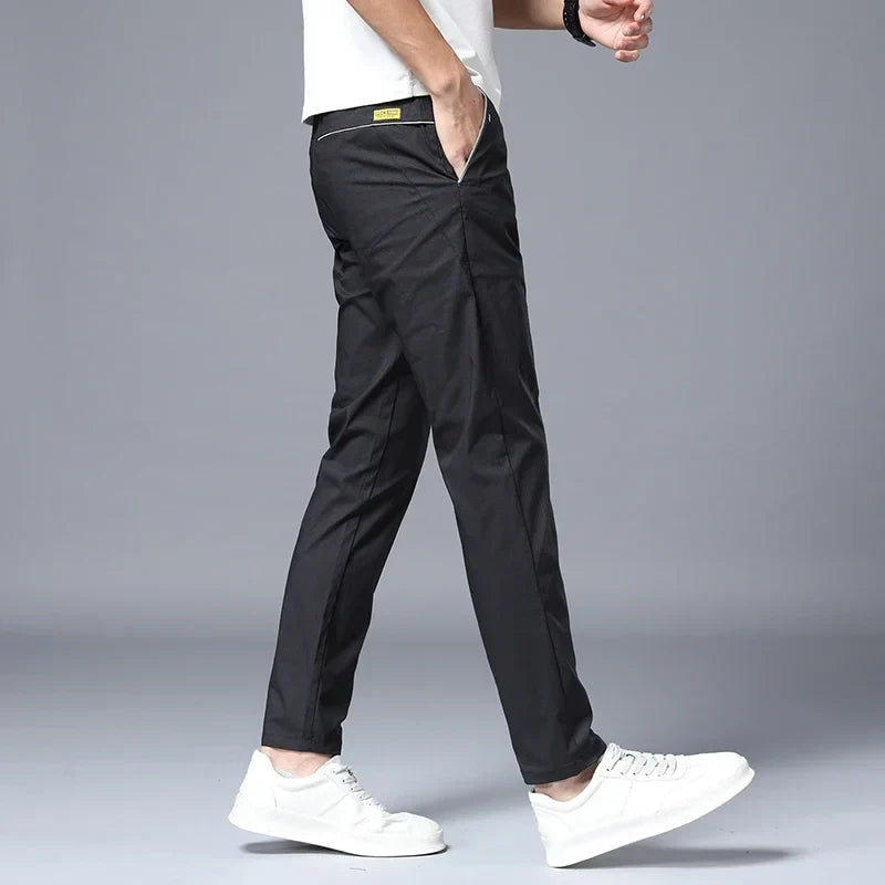 Man wearing versatile slim fit men's pants, perfect for comfortable and stylish everyday casual wear.