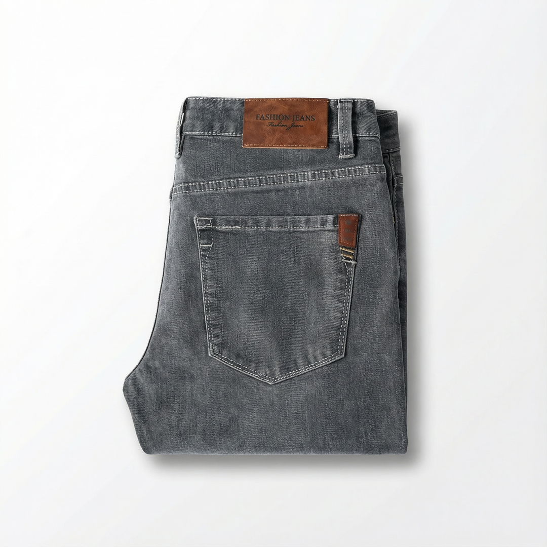 Stylish men's slim fit tapered jeans, stretch denim for durable, breathable performance and fashion.
