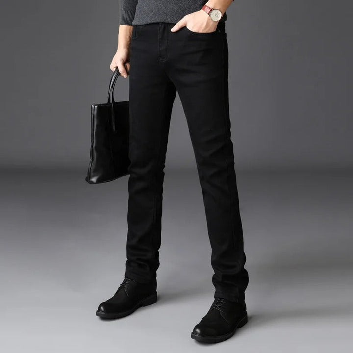 Durable men's slim fit tapered jeans, stretch comfort denim for active lifestyle & modern casual looks.