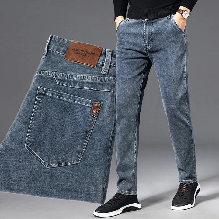 Performance men's slim tapered jeans, featuring stretch for ultimate comfort & stylish everyday wear.