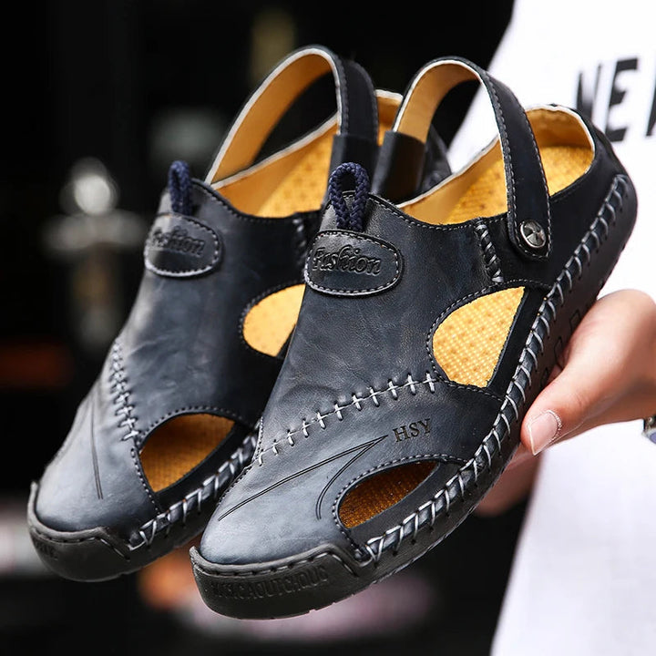 Men's casual slip-on sandals: closed-toe design, adjustable strap, breathable, cushioned for summer comfort.