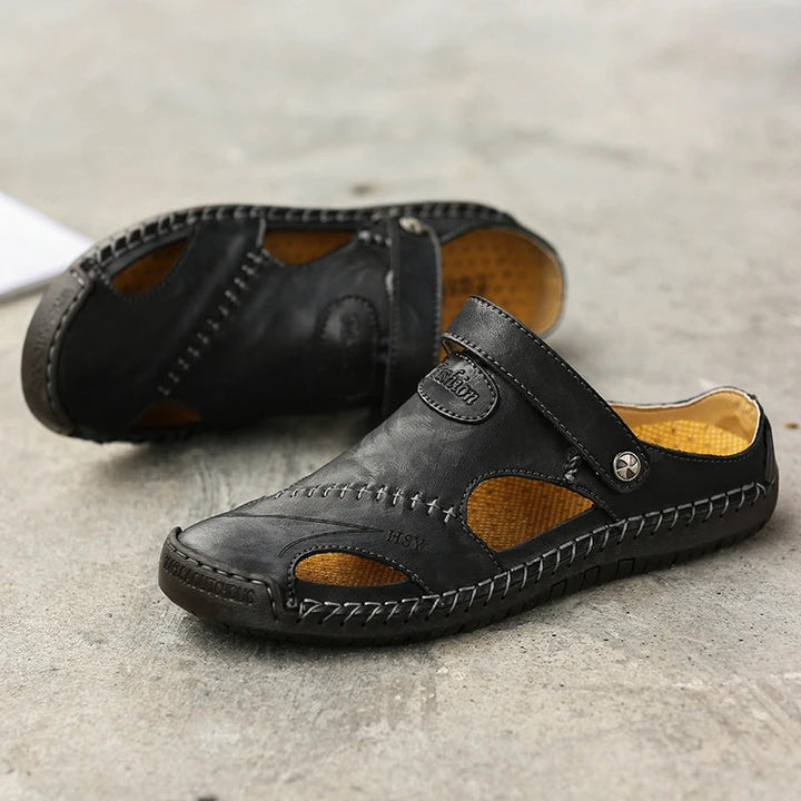 Top view: men's slip-on sandals, showing breathable closed-toe design & comfortable cushioned footbed.