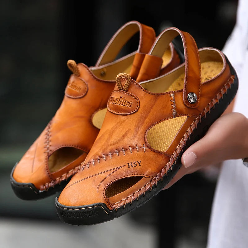 Bottom view: men's non-slip slip-on sandals, highlighting durable sole & cushioning for outdoor wear.