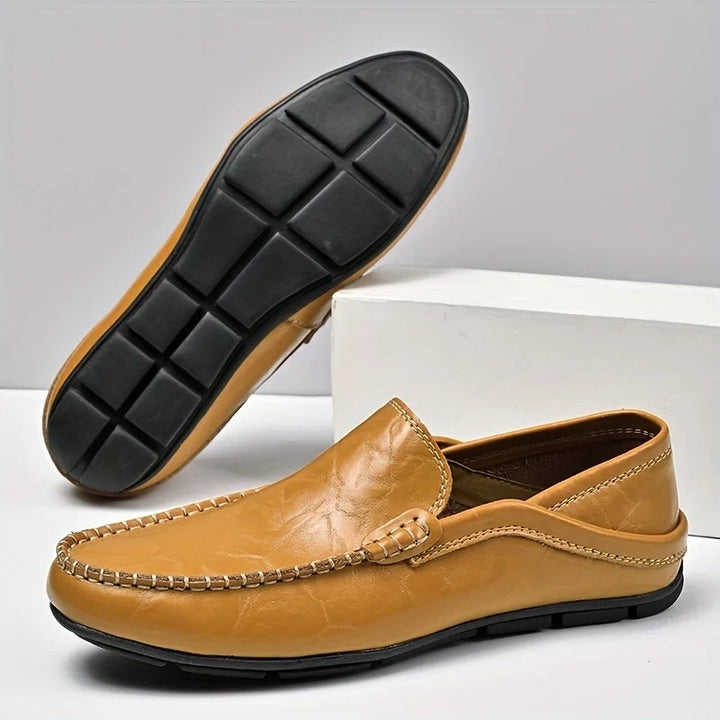 Versatile men's slip-on walking loafers. Comfortable dress shoes, ideal for casual, work, or everyday fashion.