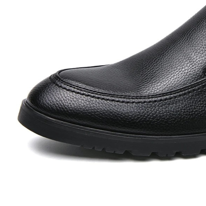 Refined men's slip-on loafers, offering comfort and style for both casual and formal settings.