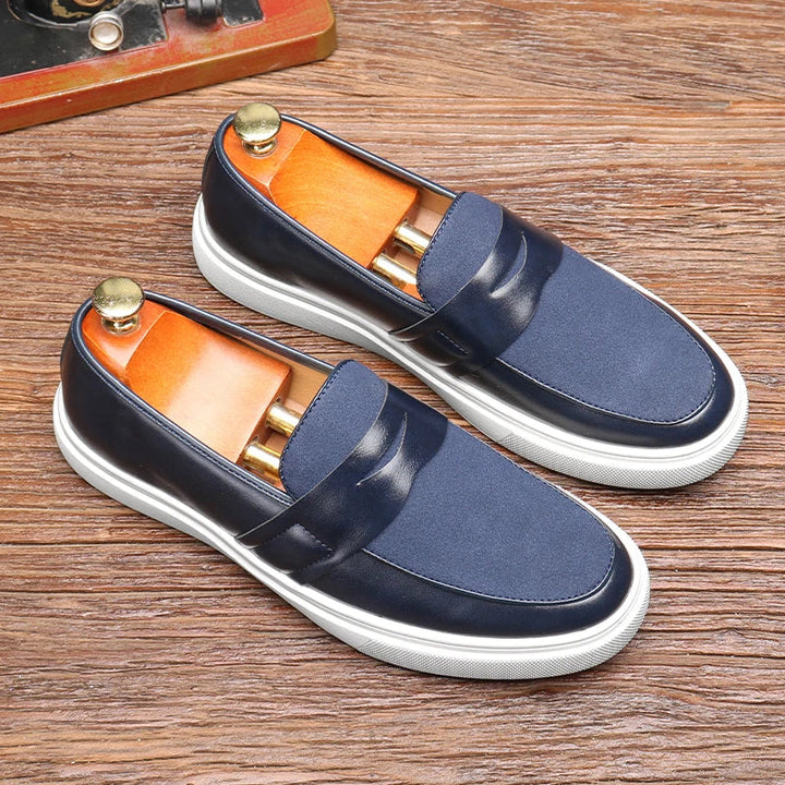Men's casual footwear: stylish slip-on loafers in a versatile shade, great for comfort.