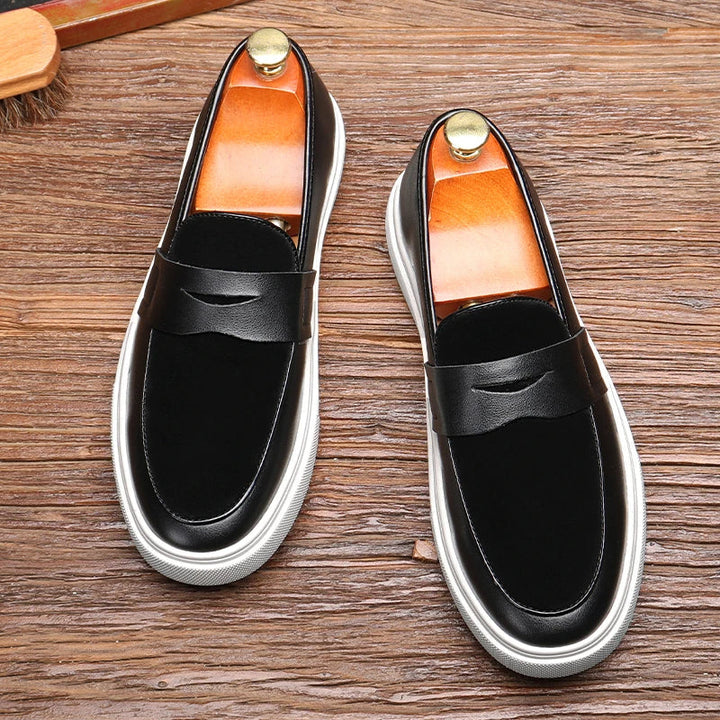 Stylish blue slip-on loafers for men. Ideal for office wear, weekend comfort, and elegant fashion.
