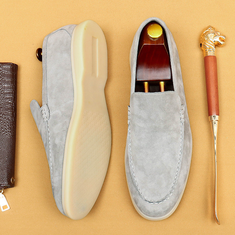 Versatile men's slip-on loafers for easy wear. Combines casual comfort with elegant dress shoe style.