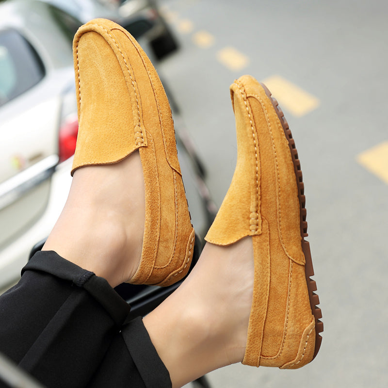 Men's slip-on loafers with a classic design, ensuring comfort and versatility for everyday wear.