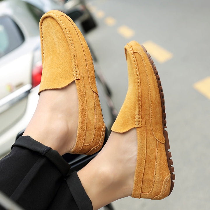 Men's slip-on loafers with a classic design, ensuring comfort and versatility for everyday wear.