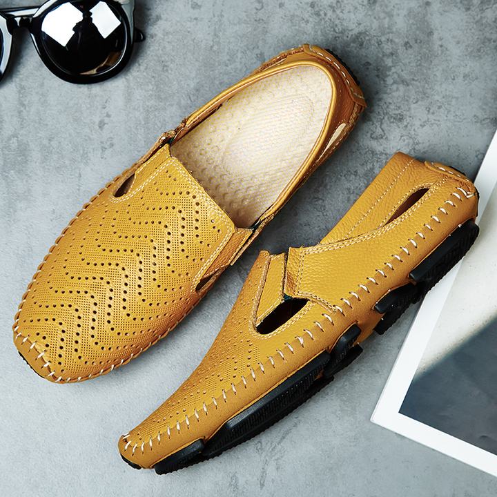 Brown leather men's slip-on loafers, classic and comfortable with cushioned insoles.