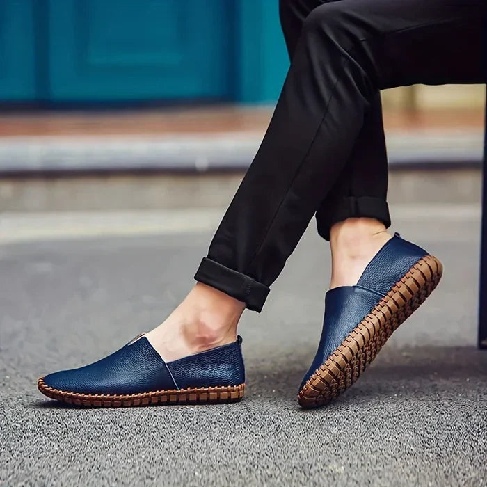 Stylish men's tan slip-on loafers, designed for easy wear and comfortable footing during summer days.