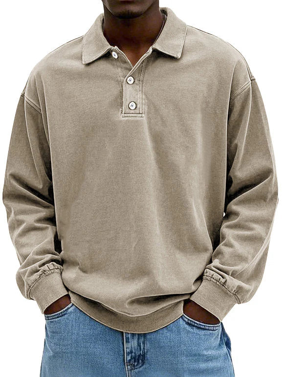 Stylish men's long sleeve collared polo, perfect for a smart casual look.