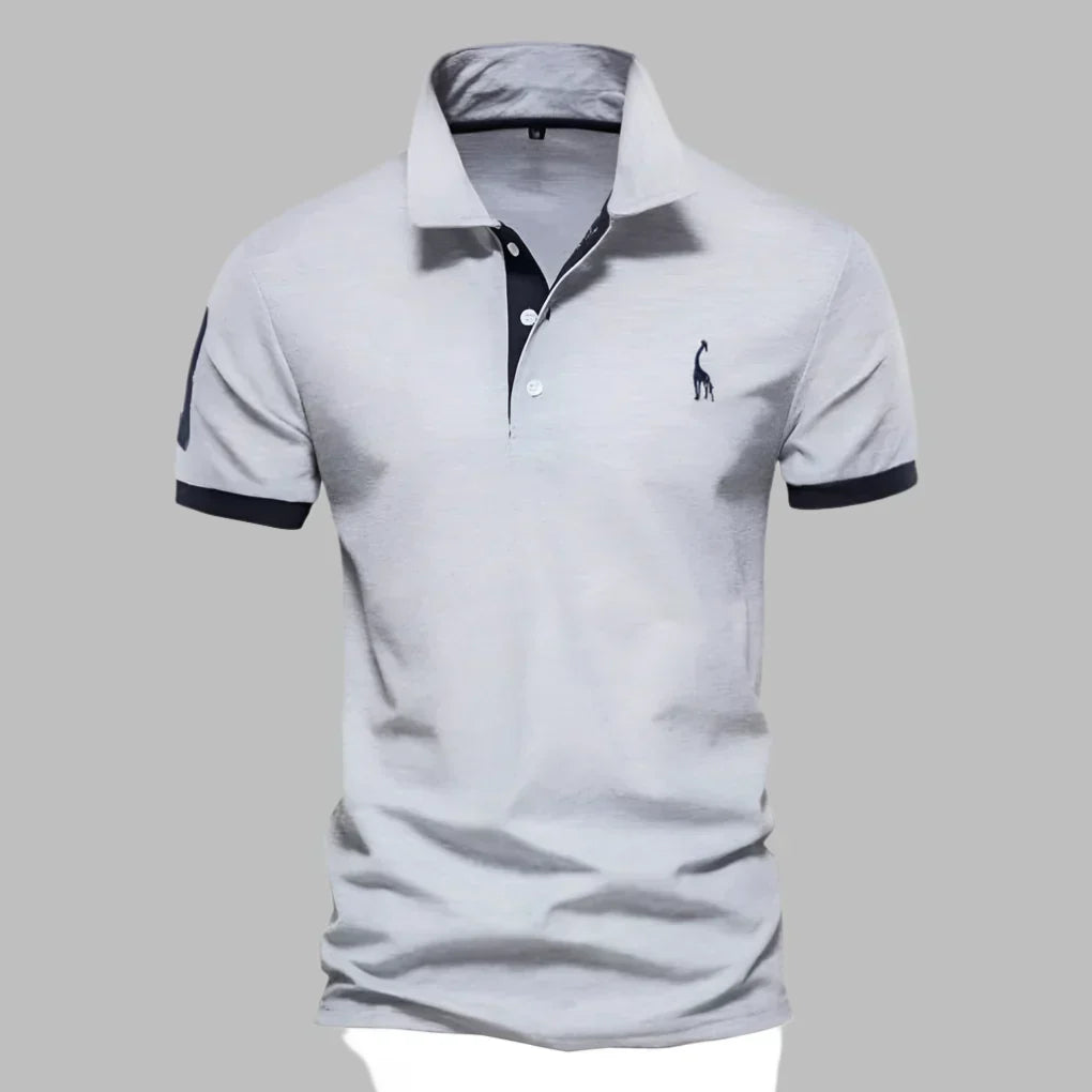 Man wearing a classic men's smart contrast trim polo shirt, suitable for versatile outfits.