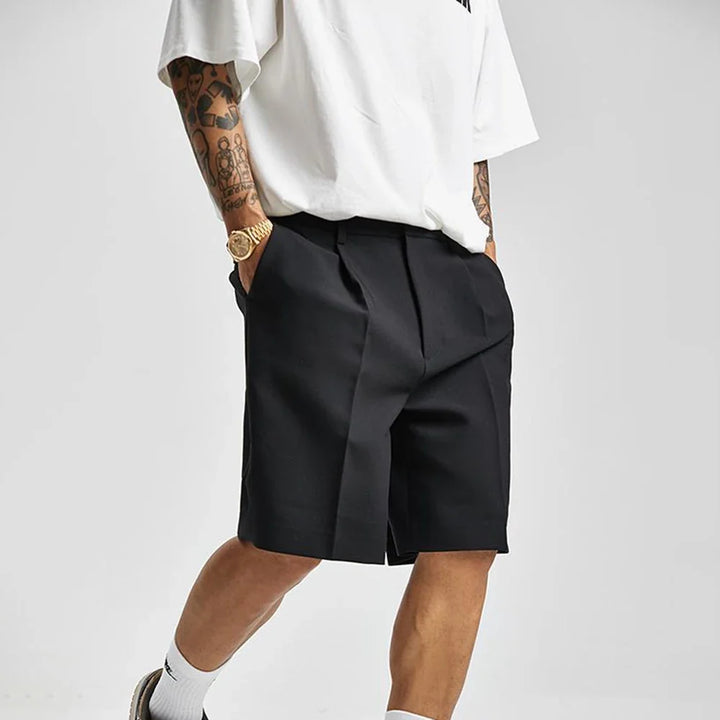 Stylish men's slim fit tailored shorts, perfect for versatile smart casual summer outfits.