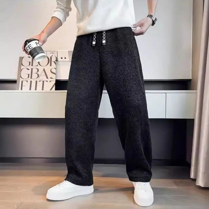 Premium men's knit lounge pants, featuring a soft brushed finish and a comfortable tapered cut.