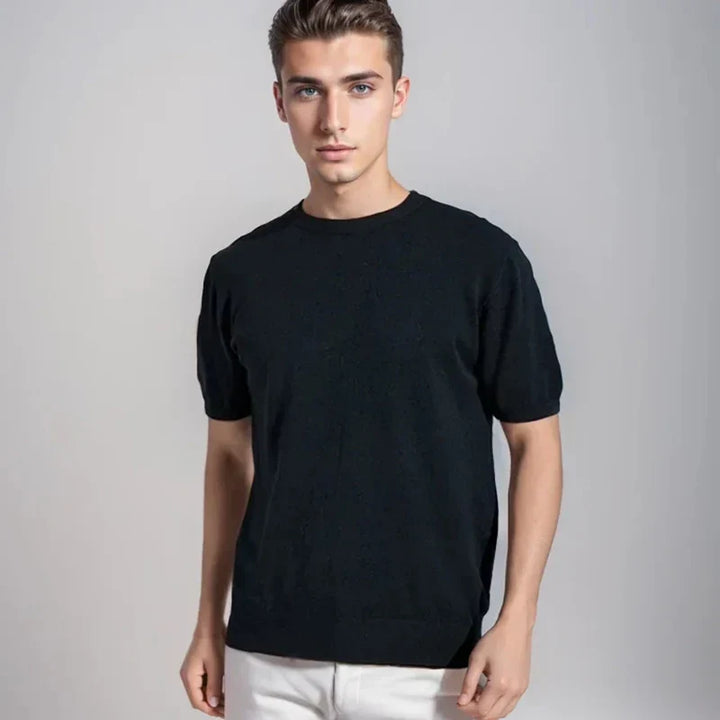 Front view of a classic white men's short-sleeve tee, an essential for a comfortable wardrobe.