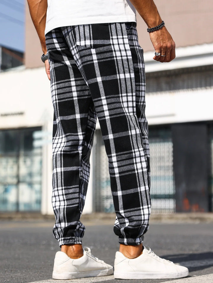 Relaxed fit men's plaid cotton joggers, essential loungewear for everyday comfort.