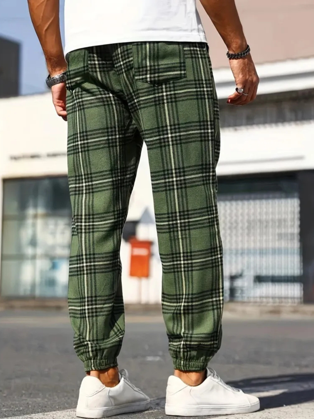 Tapered fit men's plaid jogger pants, stylish for casual fashion.