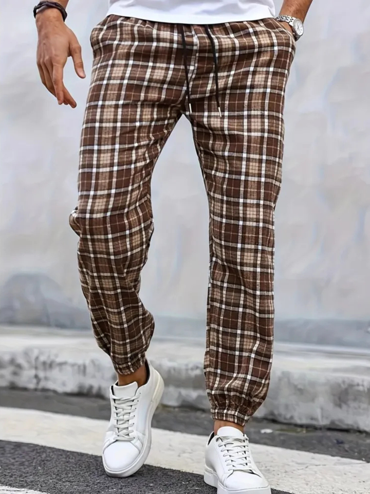 Stylish men's plaid joggers in soft cotton, perfect for modern casual fashion.