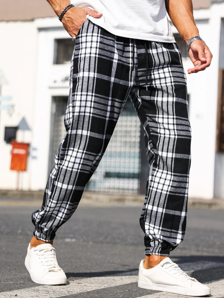 Men's versatile plaid jogger pants, soft cotton comfort for home or casual outings.