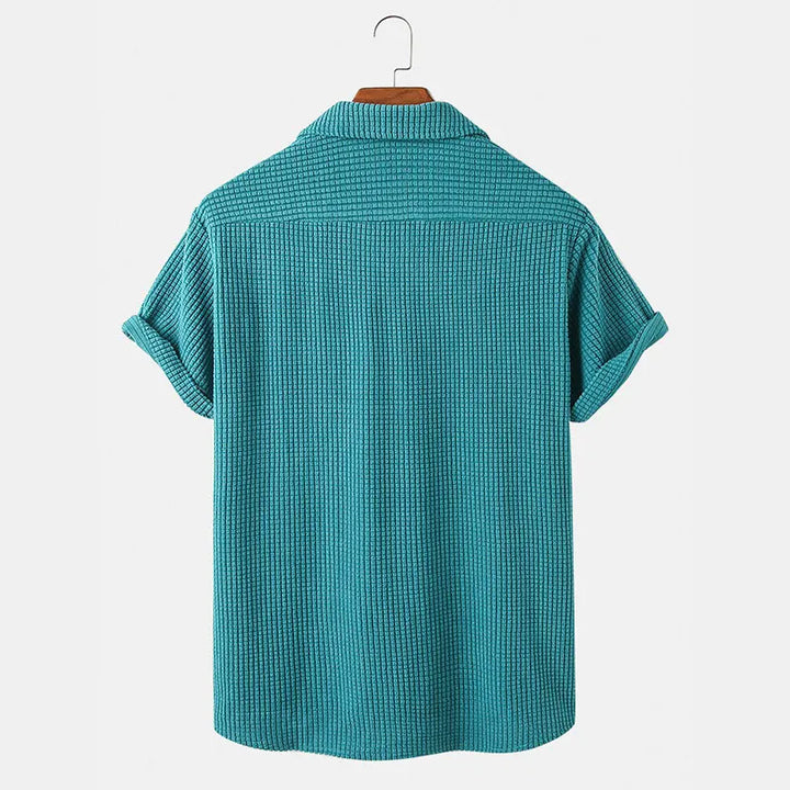 Versatile men's corduroy casual shirt, button-up design for comfortable, stylish wear.