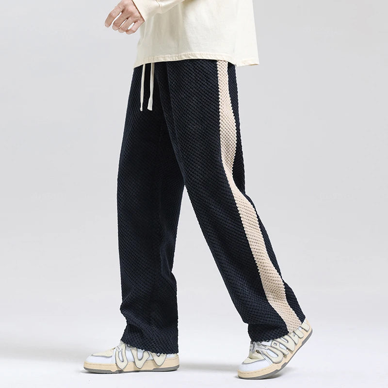Modern men's relaxed fit trousers, soft textured for ultimate comfort. Stylish casual pants perfect for everyday autumn/winter fashion.