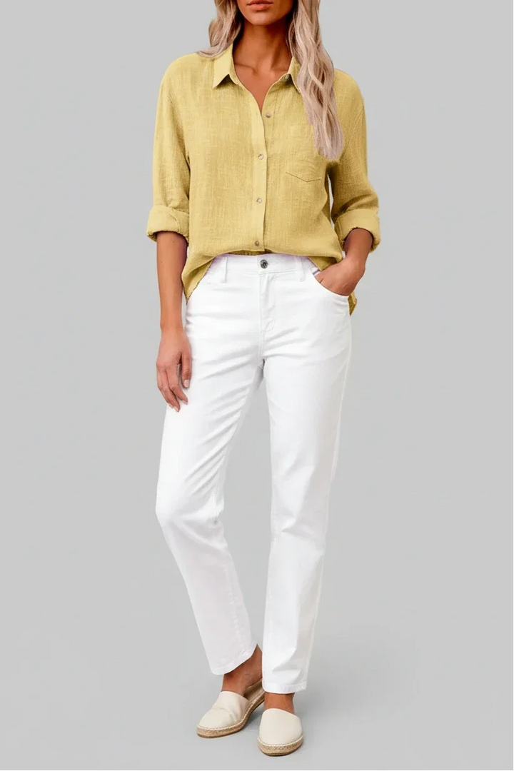 Close-up of a men's breathable lightweight button-up shirt, showing its soft, comfortable solid fabric texture.