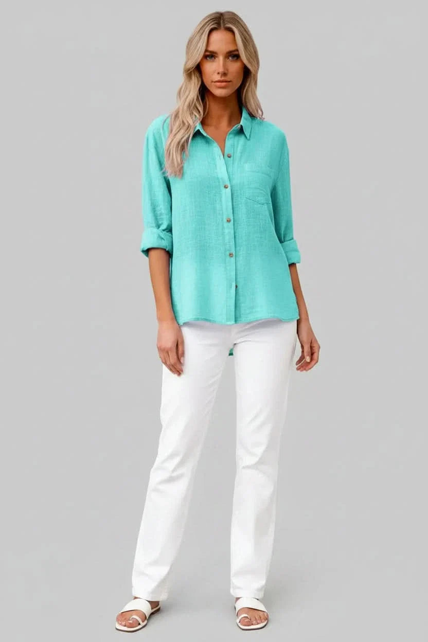 Back view of a versatile men's solid button-up shirt, lightweight and breathable for various casual occasions.