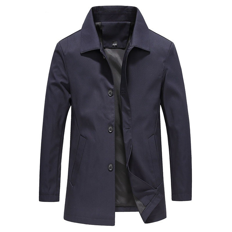 Men's solid color long windproof coat for autumn/winter. Stylish casual & formal outerwear, offering warmth & protection.