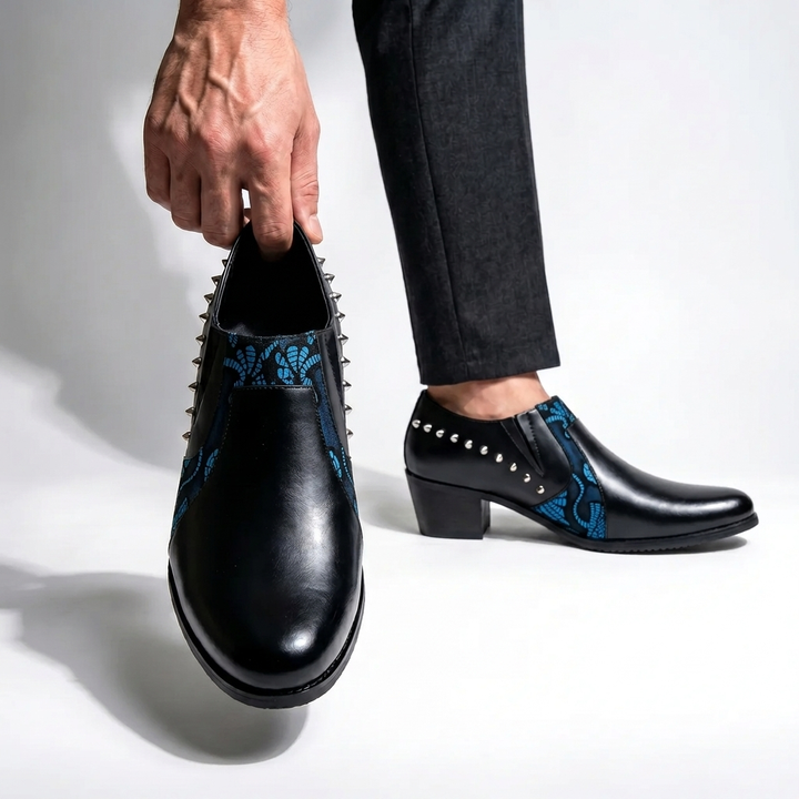 Modern black pointed-toe loafers for men, designed with unique blue accents; perfect dress shoes for formal events.
