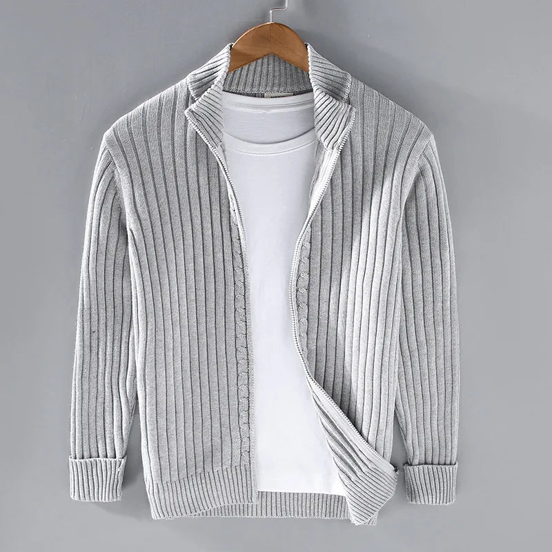 Men's sophisticated ribbed knit zip-up sweater in cotton. Perfect for elegant or casual layering menswear.