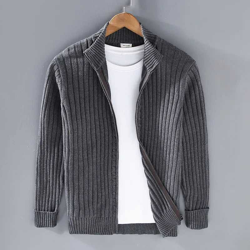 Close-up of men's rib knit zip sweater, showcasing texture & high-quality zipper detail. Cotton comfort.