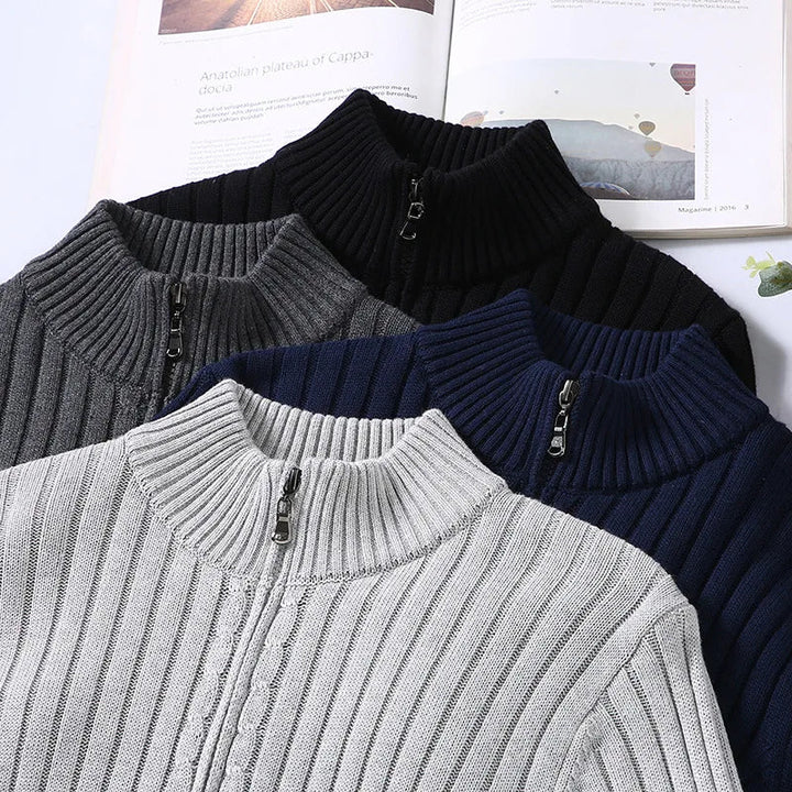 Men's zip-up rib knit sweater layered over a shirt, showing versatile, elegant, and casual styling.