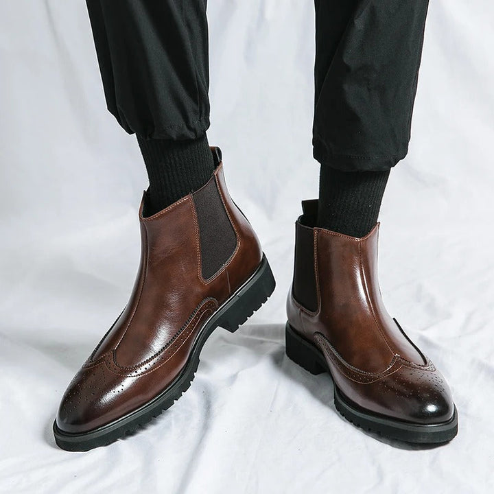 Sophisticated men's brown Chelsea boots, comfortable slip-on for daily wear.