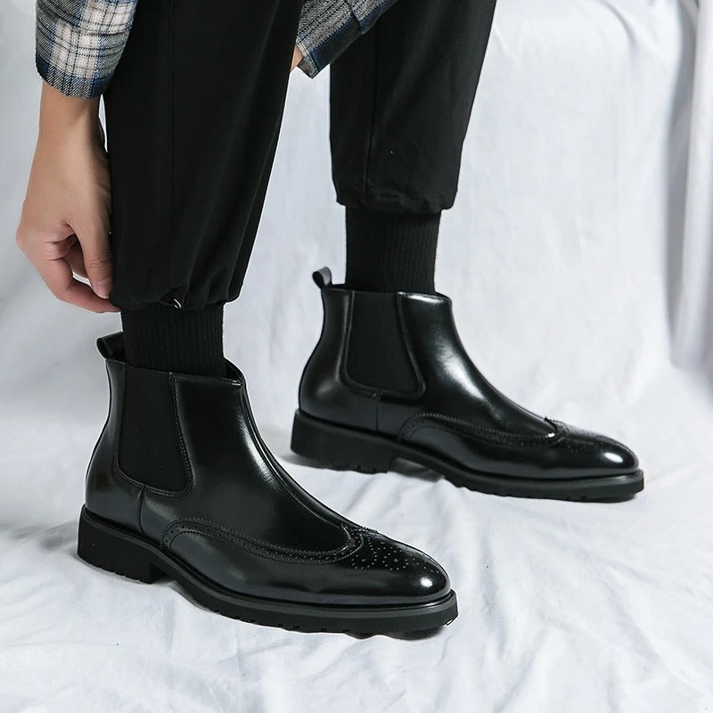 Fashionable men's brown Chelsea boots, comfortable slip-on for versatile styling.