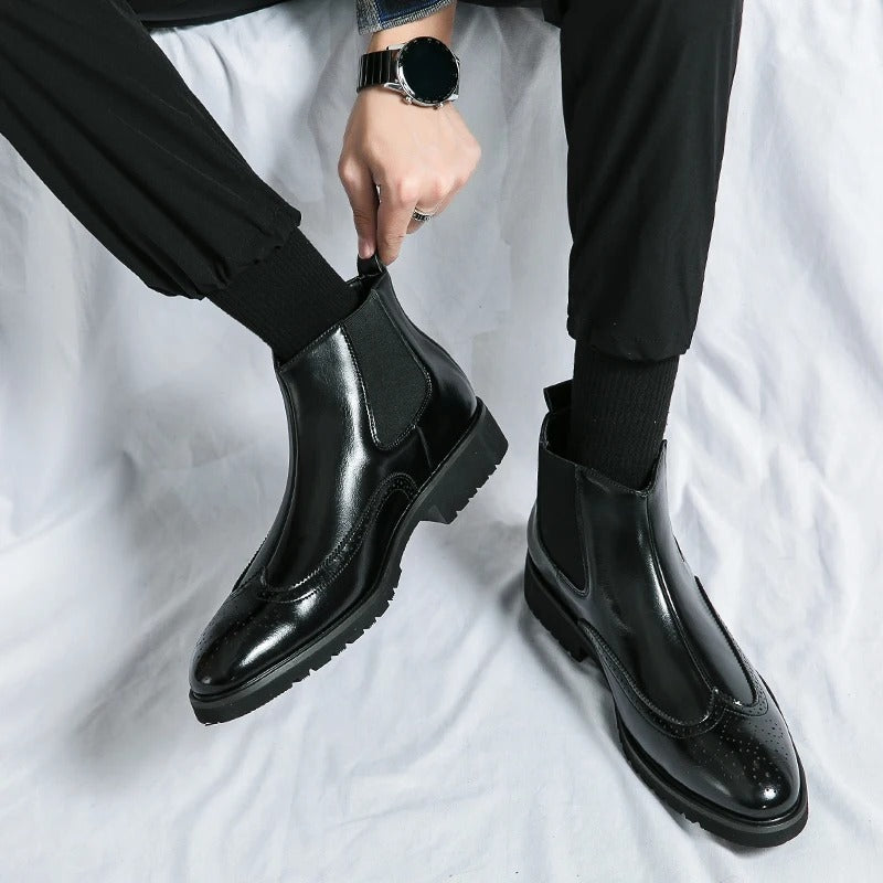 Men's refined slip-on dress boots, Chelsea design with subtle brogue detailing.