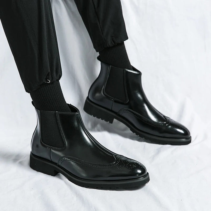 Gents' sophisticated slip-on Chelsea boots, combining comfort & sleek style effortlessly.
