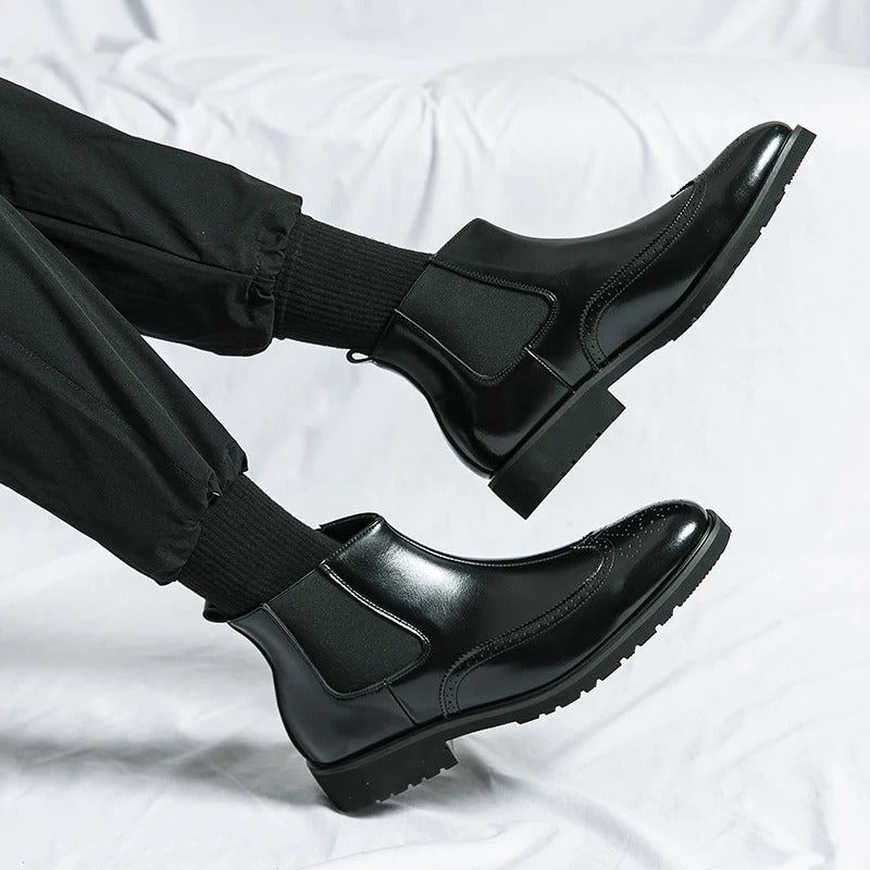Men's chic Chelsea boots, slip-on design with a contemporary, sophisticated touch.