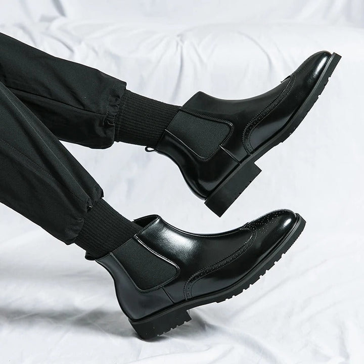 Men's chic Chelsea boots, slip-on design with a contemporary, sophisticated touch.