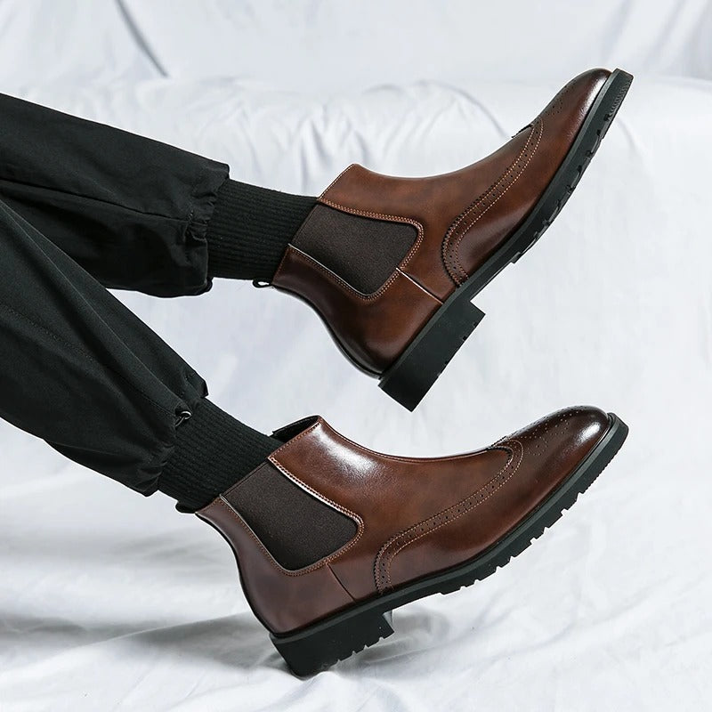 Classic men's black slip-on Chelsea boots, timeless elegance for dress or casual.