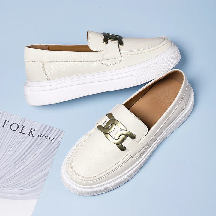 Comfortable men's buckle loafers. Stylish slip-on dress shoes for casual or formal occasions. Modern design footwear.