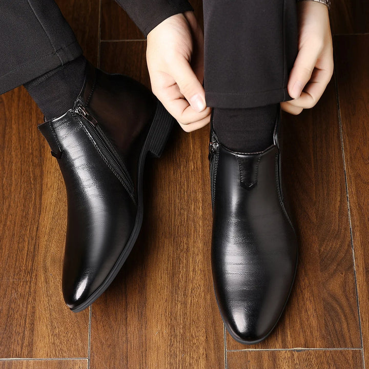 Classic men's Sorrento ankle boots with a sleek zippered design, offering both comfort and sophisticated style.