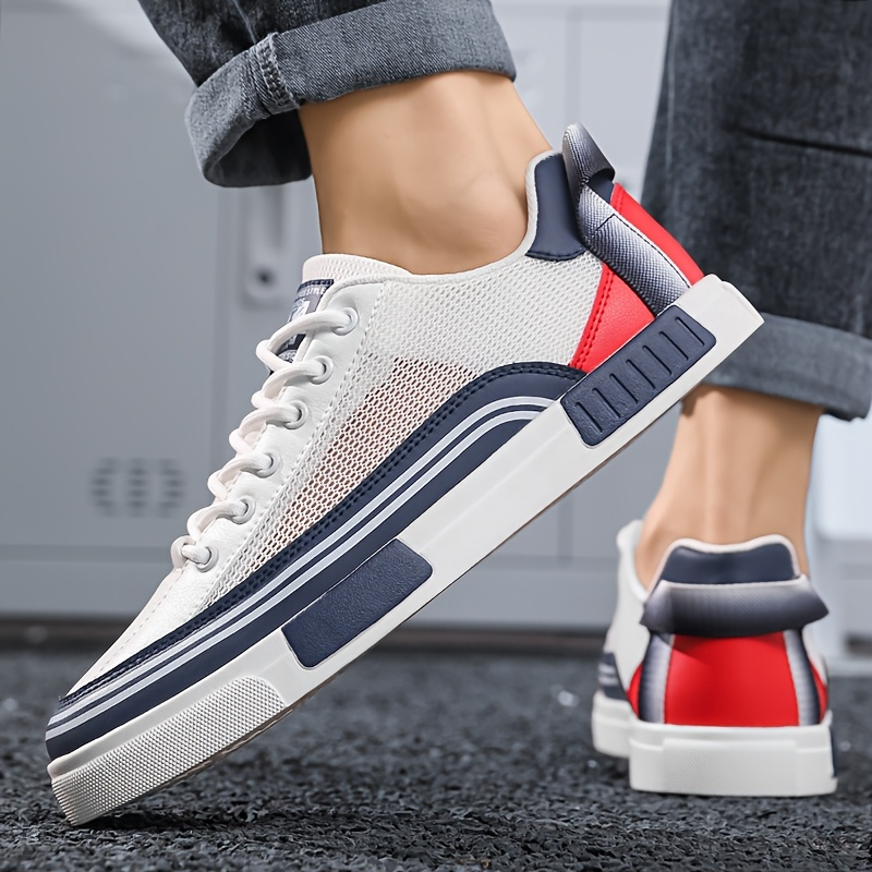Top view: Men's Sorrento lace-up casual black sneakers with subtle blue accent.