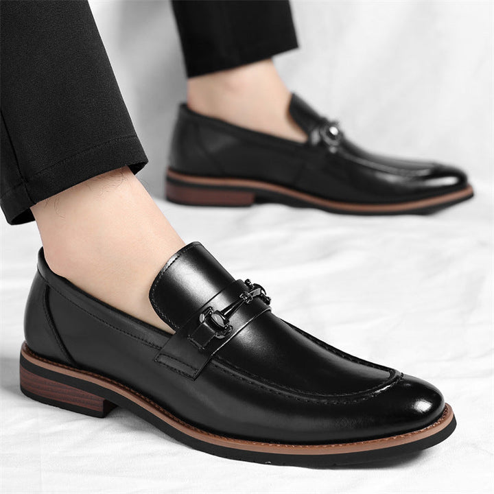 Sharp pointed toe men's Sorrento slip-on loafers, essential dress shoes for a refined and professional look.
