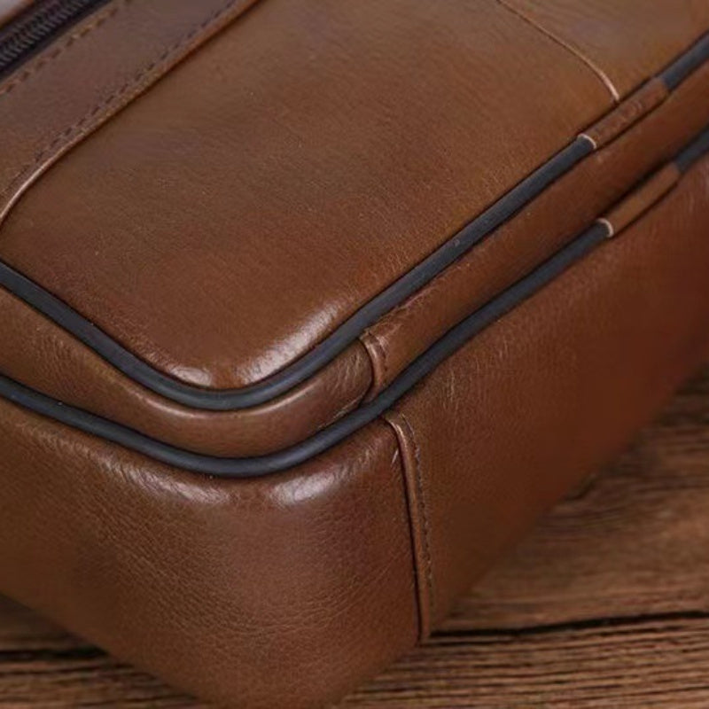 Organized men's shoulder bag for daily essentials, travel-ready with adjustable strap.