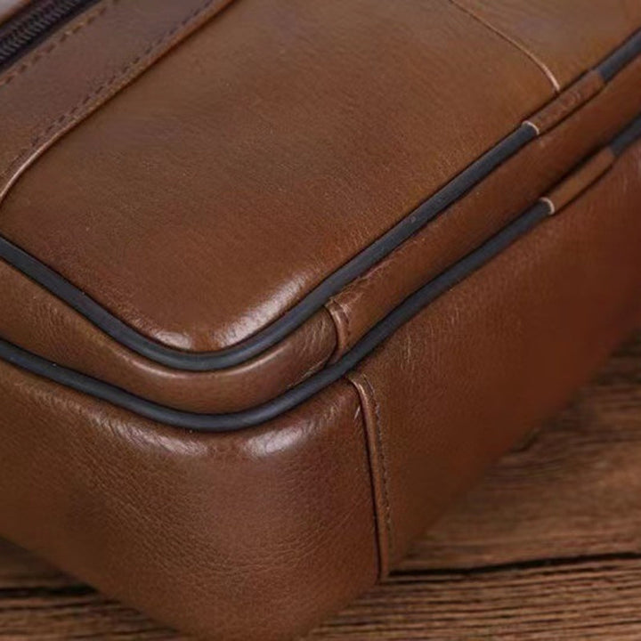 Organized men's shoulder bag for daily essentials, travel-ready with adjustable strap.