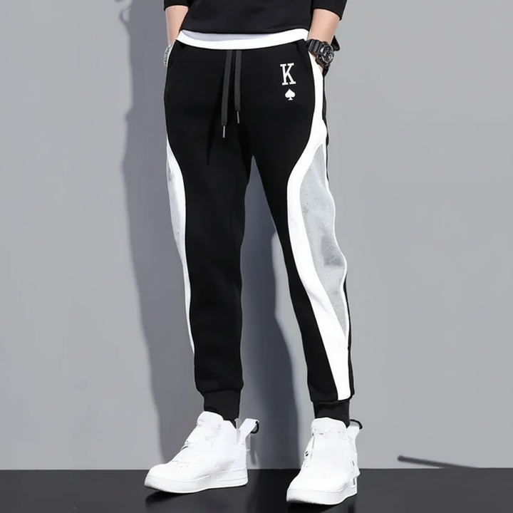 Men's athletic jogging pants in black, versatile for sport and everyday fashion.